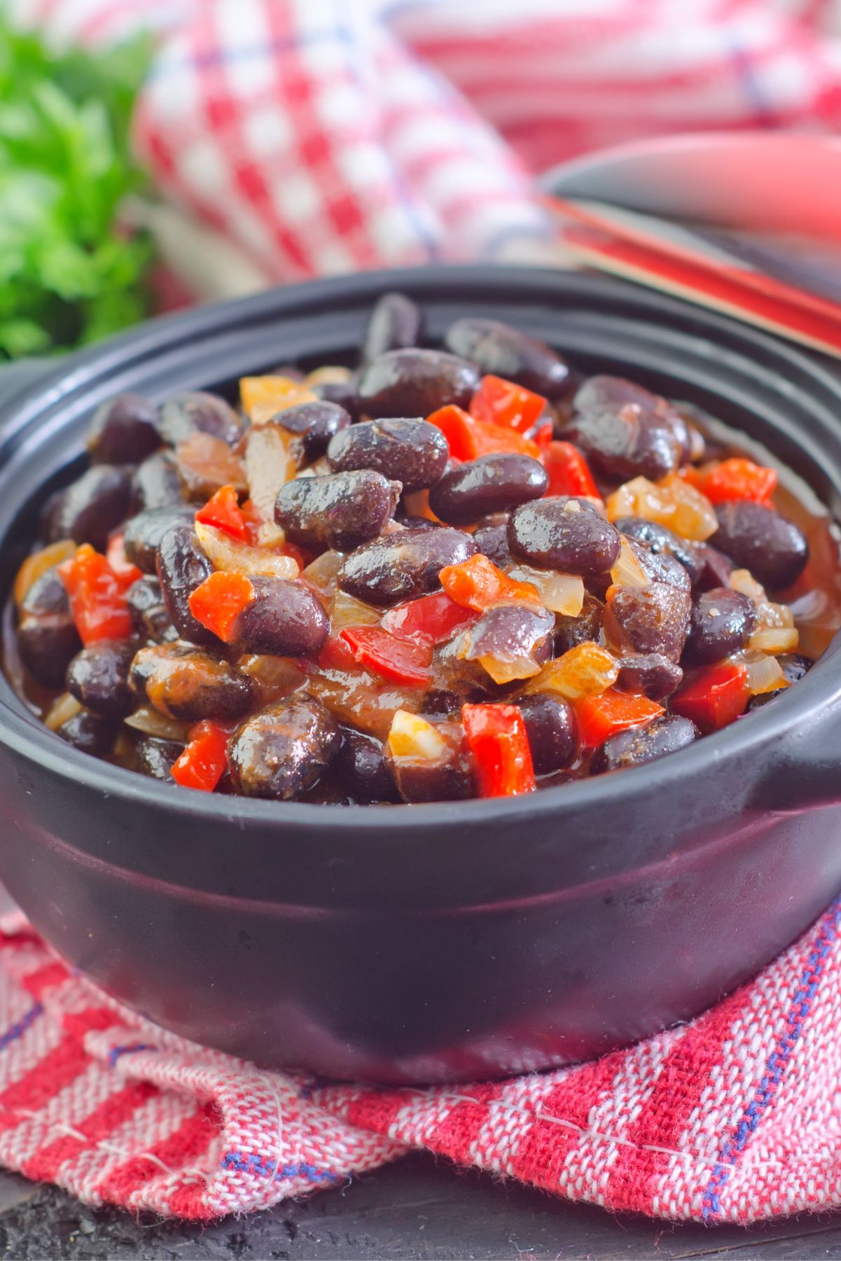 Closeup of Weight Watchers Black Bean and Lentil Chili in a black pot.