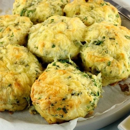 Weight Watchers Cheddar Bay Biscuits on a white plate.