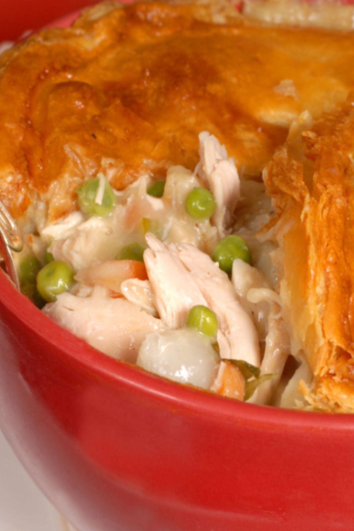 Closeup of Weight Watchers Chicken Pot Pie in a red bowl.