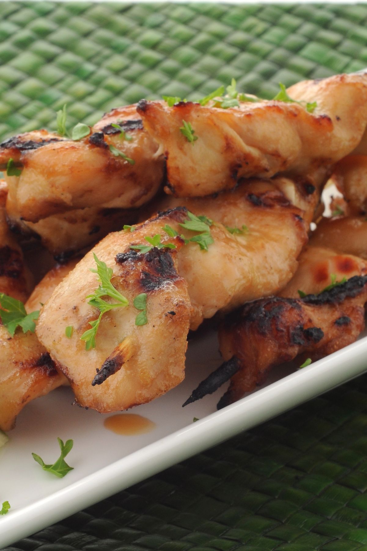 Closeup of Weight Watchers Thai Grilled Chicken on a white plate.