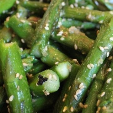 Closeup of Weight Watchers Sesame Asparagus in a white bowl.