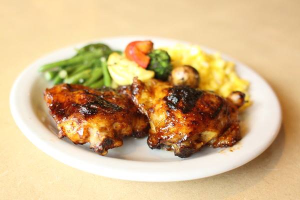 Key West chicken on a plate with vegetables