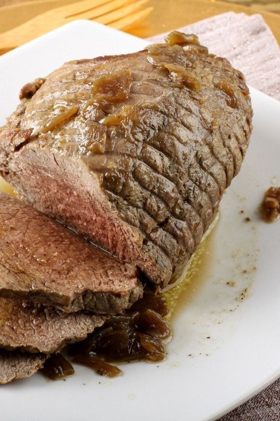 Slow Cooker Roast Beef on a white platter.