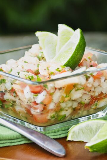 Closeup of Weight Watchers Avocado and Shrimp Ceviche in a clear glass bowl.