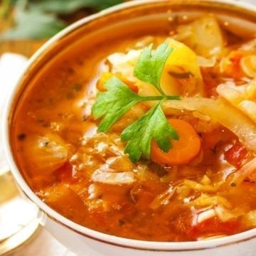 Weight Watchers Cabbage Fat Burning Soup in a white bowl.