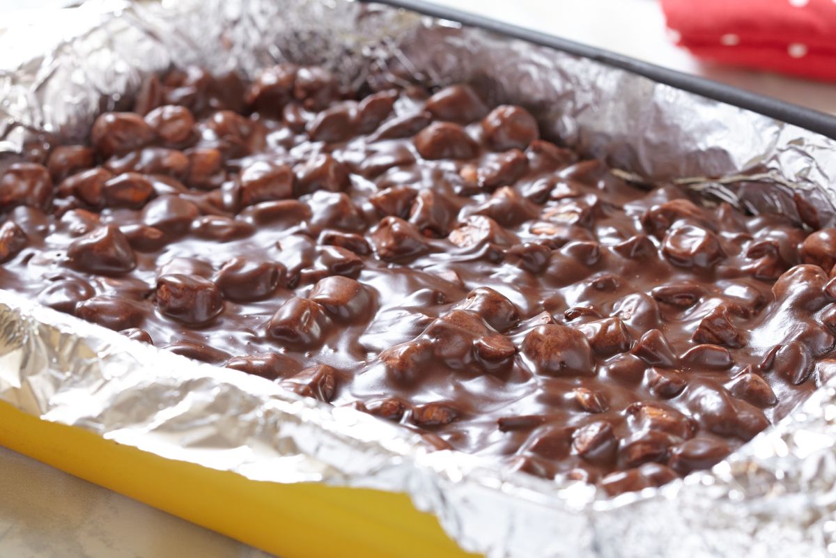 Weight Watchers Chocolate Marshmallow Bark in an aluminum foil lined, yellow baking dish.