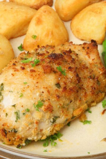 Weight Watchers Parmesan Garlic Chicken on a plate with potatoes