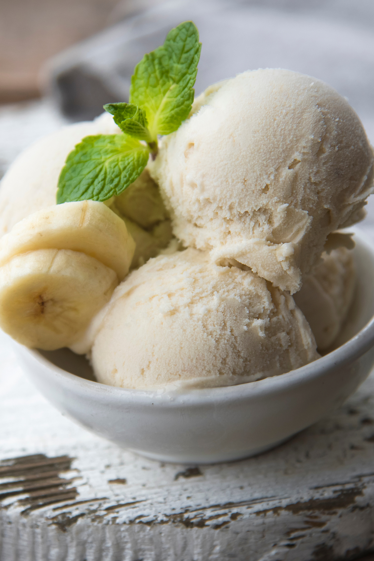 Closeup of Weight Watchers Banana Ice Cream in a white bowl.