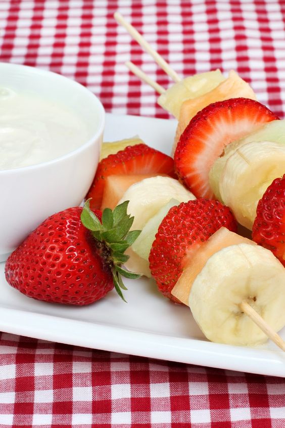 Weight Watchers Fruit Skewers on a  white plate.