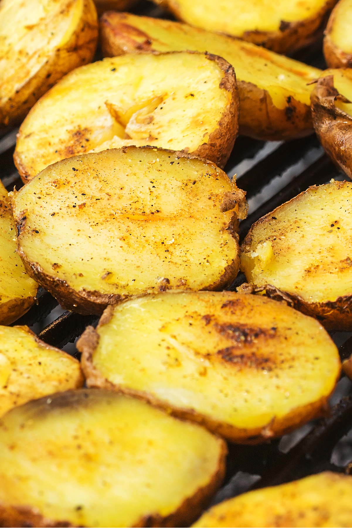 Closeup of Easy Weight Watchers Grilled Potatoes on a grill.
