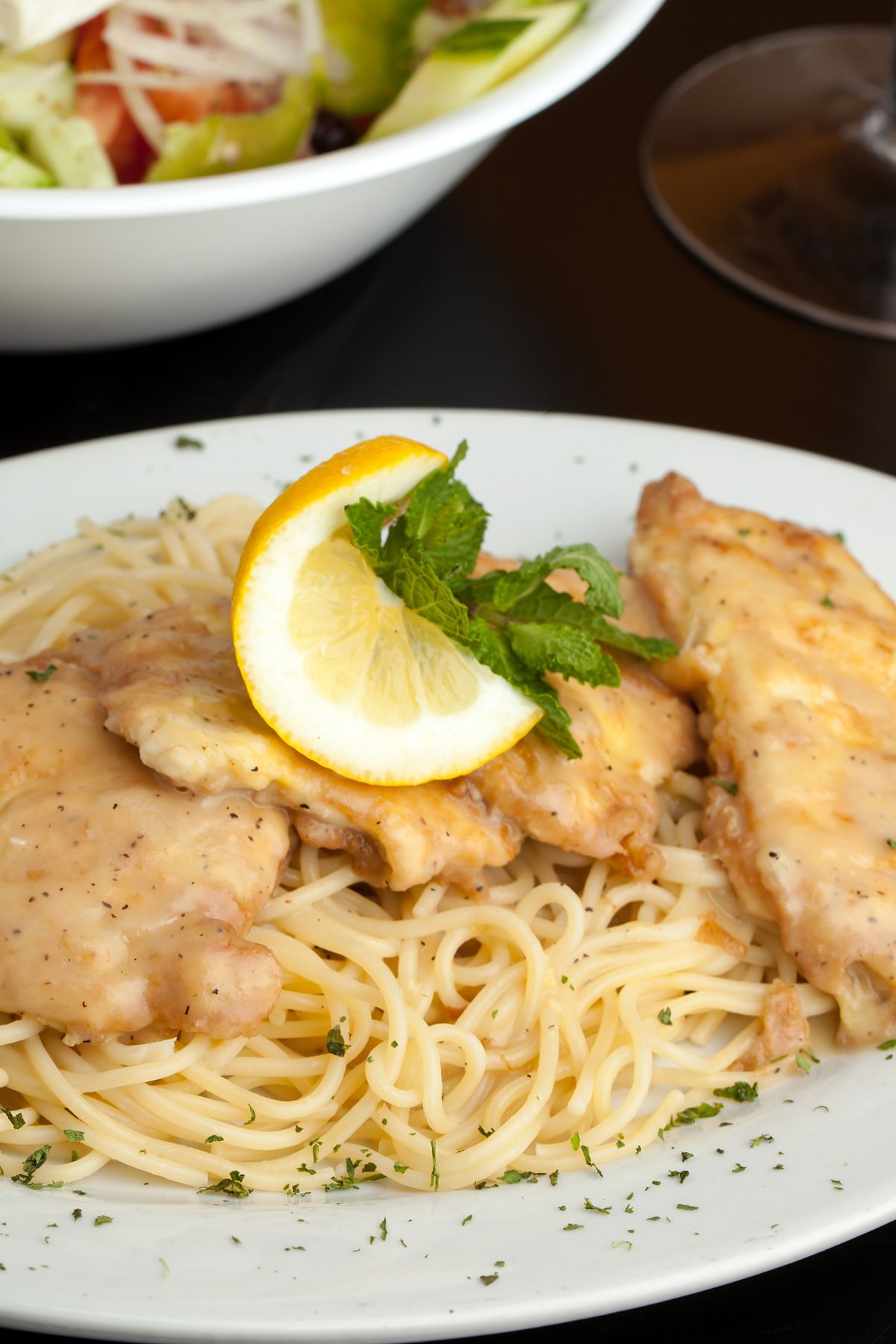 Weight Watchers Quick Garlic Lemon Chicken on a white plate.