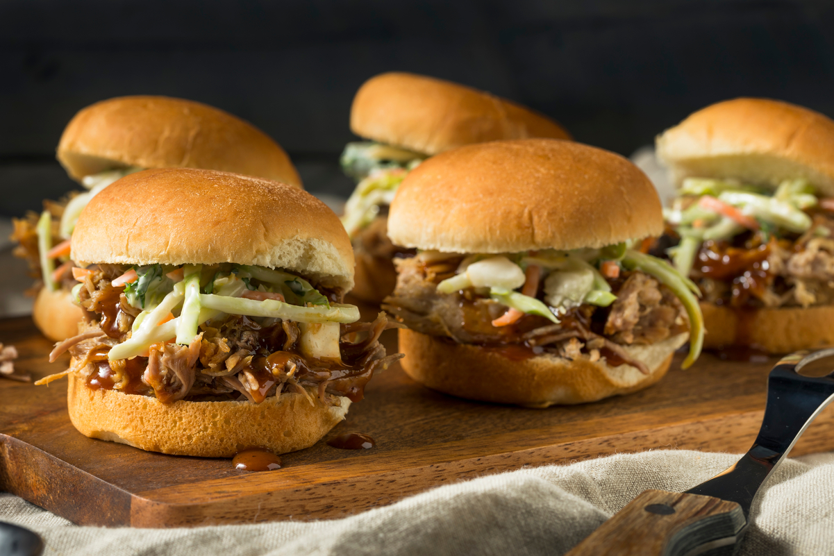 5 Weight Watchers Chicken Sliders on a wooden cutting board.