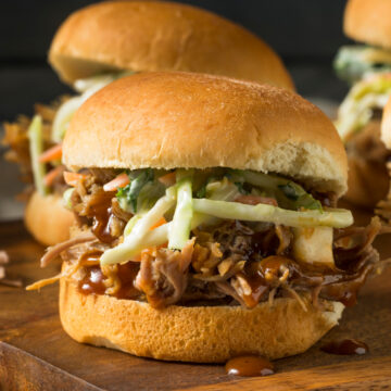 Closeup of Chicken Slider on a wooden cutting board.