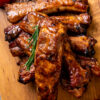 Weight Watchers Oven-Baked Baby Back Ribs on a cutting board.