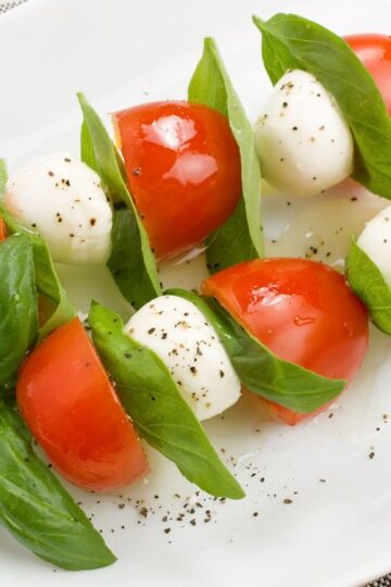 Weight Watchers Italian Caprese Skewers on a white plate.