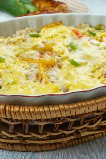 Weight Watchers Mexican Beans and Rice Casserole in a white dish sitting in a wooden basket.