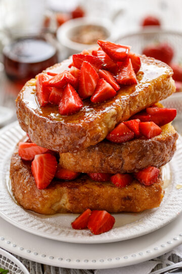 A stack of Best Grilled French Toast on a white plate.