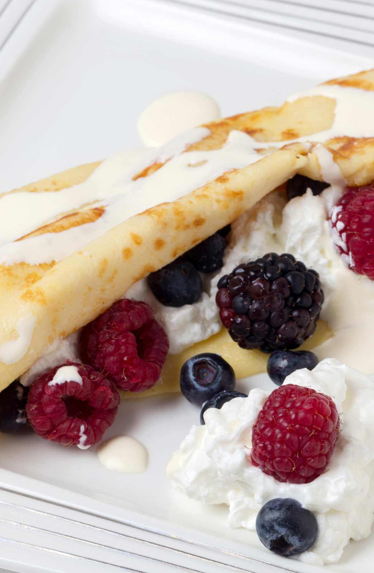 Weight Watchers Mixed Berry Crepe on a white surface.