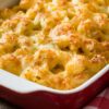 Weight Watchers Creamy Macaroni and Cheese in a red and white casserole dish.