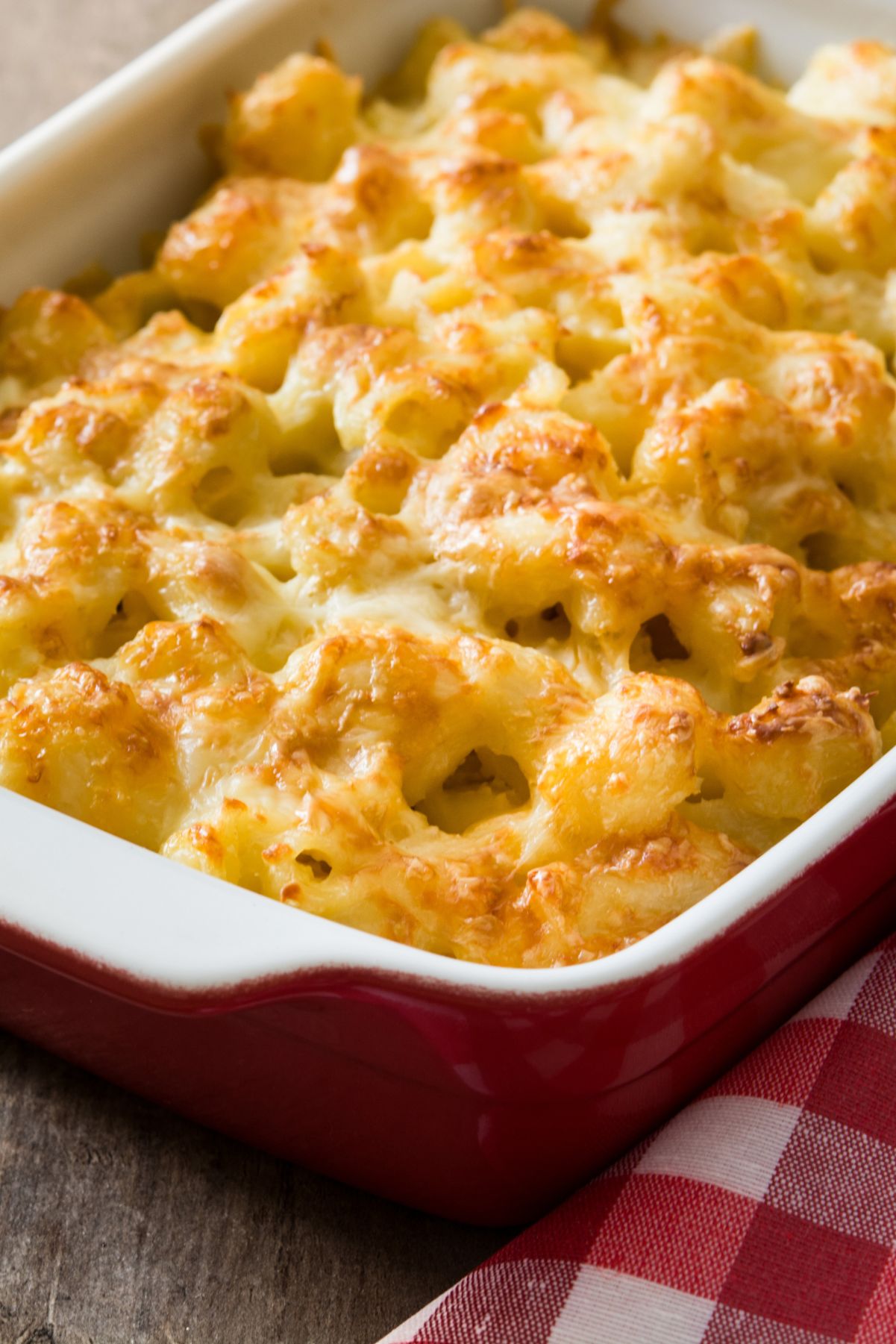 Closeup of Weight Watchers Creamy Macaroni and Cheese in a white casserole dish.
