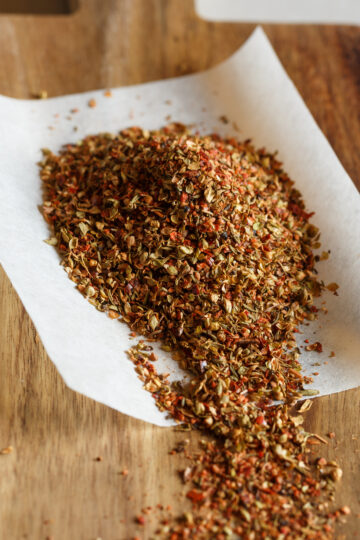 Homemade Spicy Cajun Dry Rub (Weight Watchers) on a white piece of parchment paper.