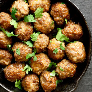 Mini Weight Watchers Italian Meatballs in a black skillet.