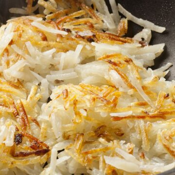 Closeup of Weight Watchers Homemade Hash Browns in a skillet.