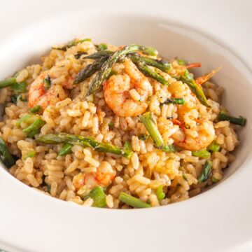 Weight Watchers Weight Watchers Shrimp Risotto with Asparagus in a white bowl.