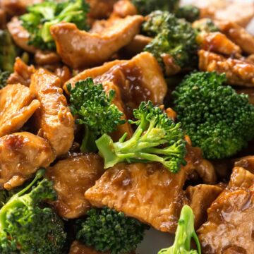 Closeup of Weight Watchers Chicken Broccoli Teriyaki on a white plate.