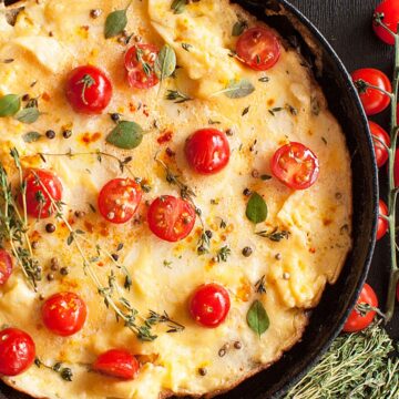 Closeup of Weight Watchers Italian Omelet in a black skillet.