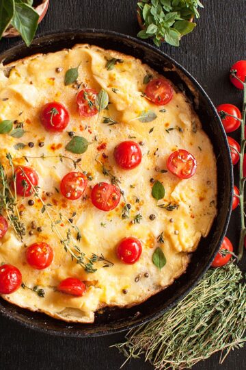Closeup of Weight Watchers Italian Omelet in a black skillet.