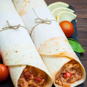 Closeup of 2 Weight Watchers Queso Chicken And Rice Wraps.