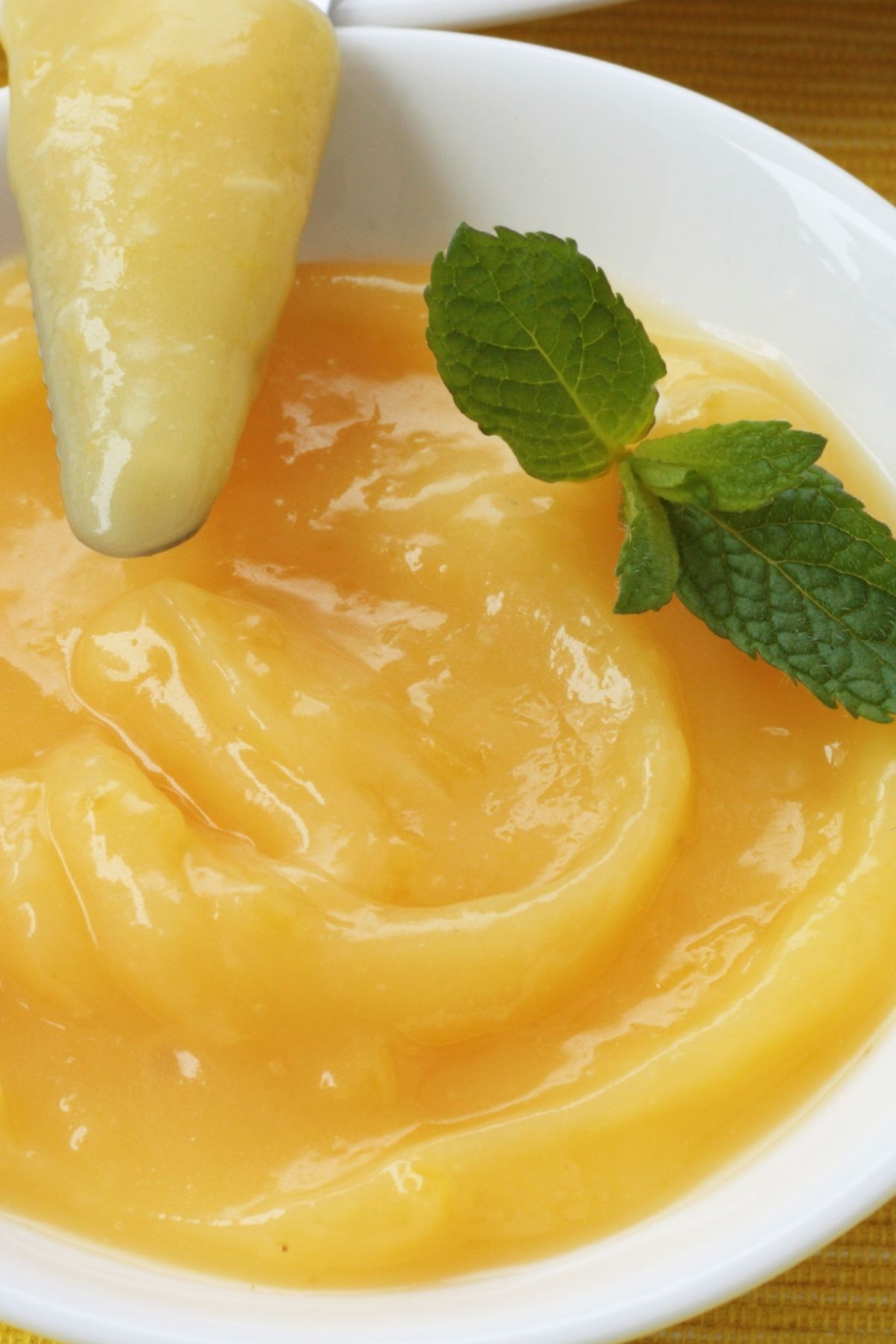 Closeup of Quick Weight Watchers Lemon Curd in a white bowl.