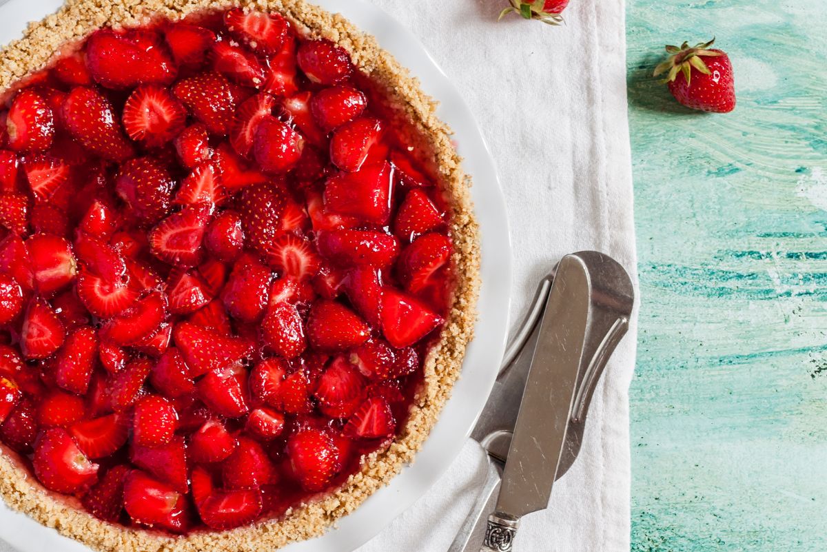 overhead view of Best Weight Watchers Strawberry Pie with a knife next to it.