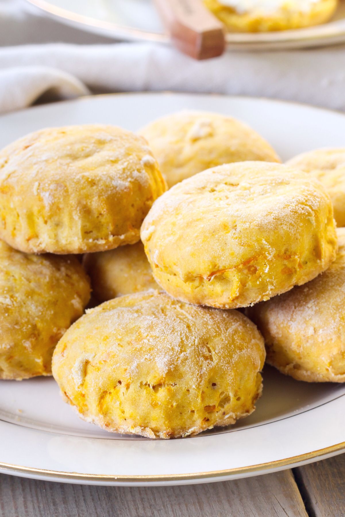 Sweet Potato Biscuits With Weight Watchers Points piled on a white plate.