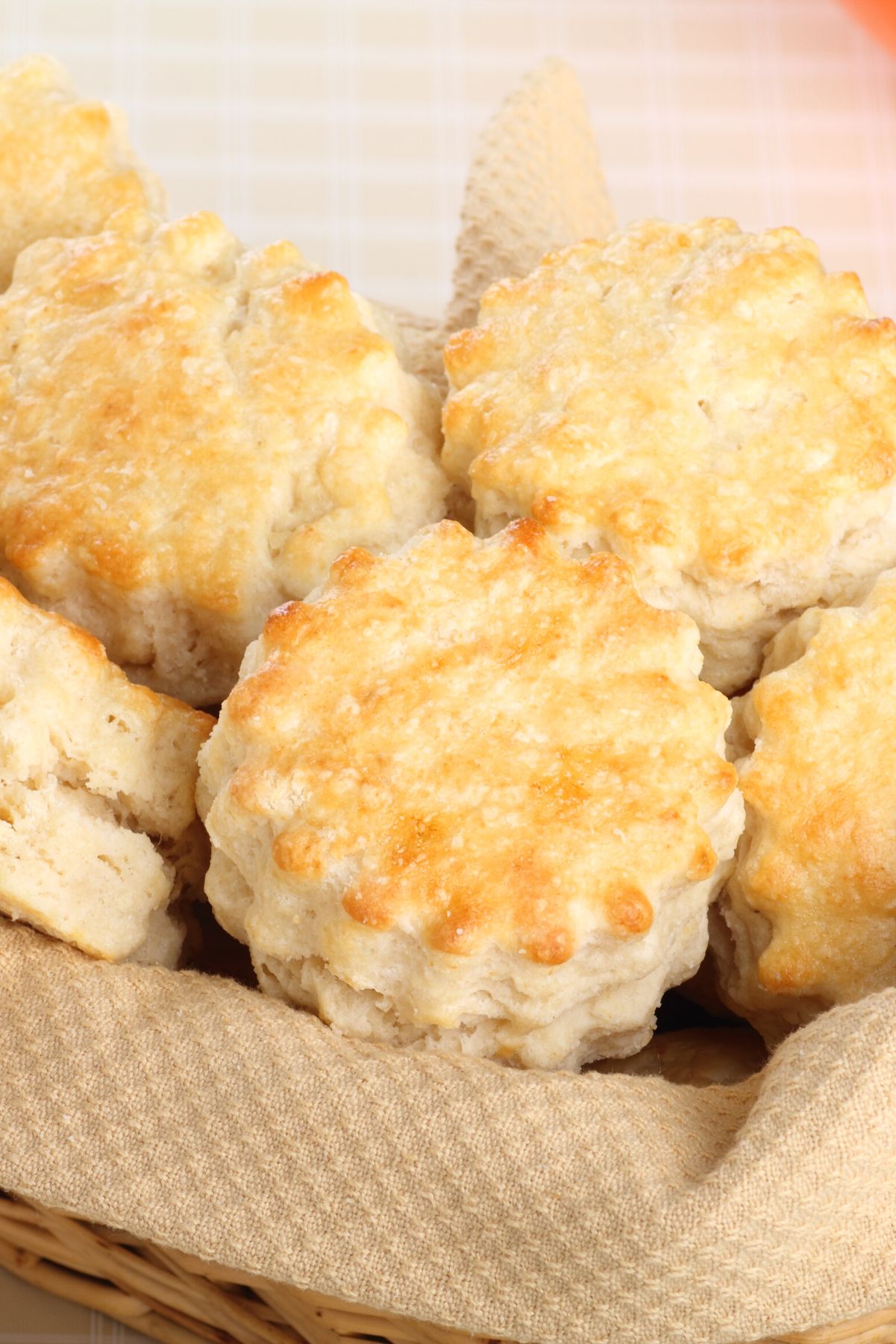 Weight Watchers Easy Biscuits in a basket lined with a tan cloth napkin.