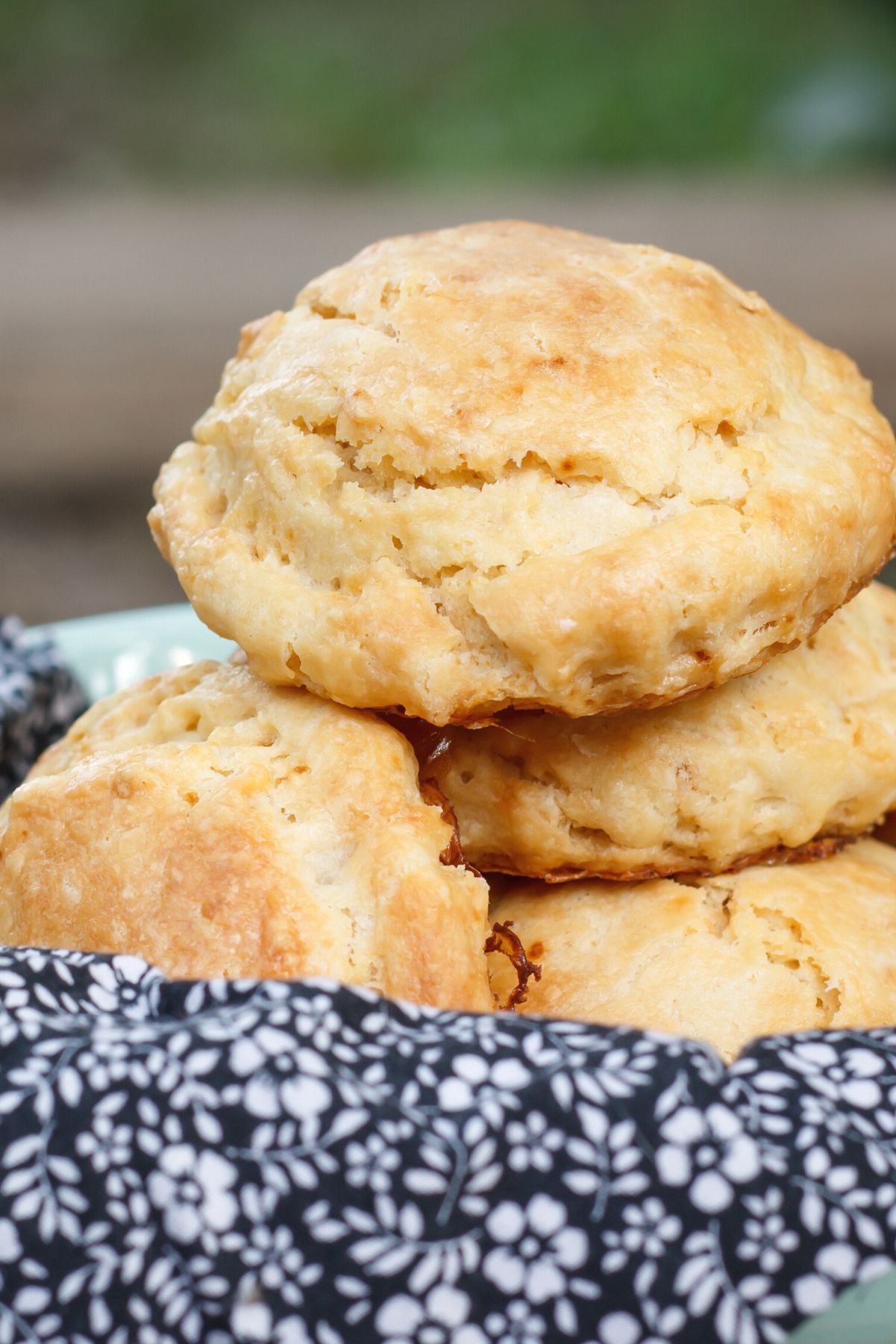 Weight Watchers Quick Biscuits in a white bowl lined with a blue and white cloth napkin.