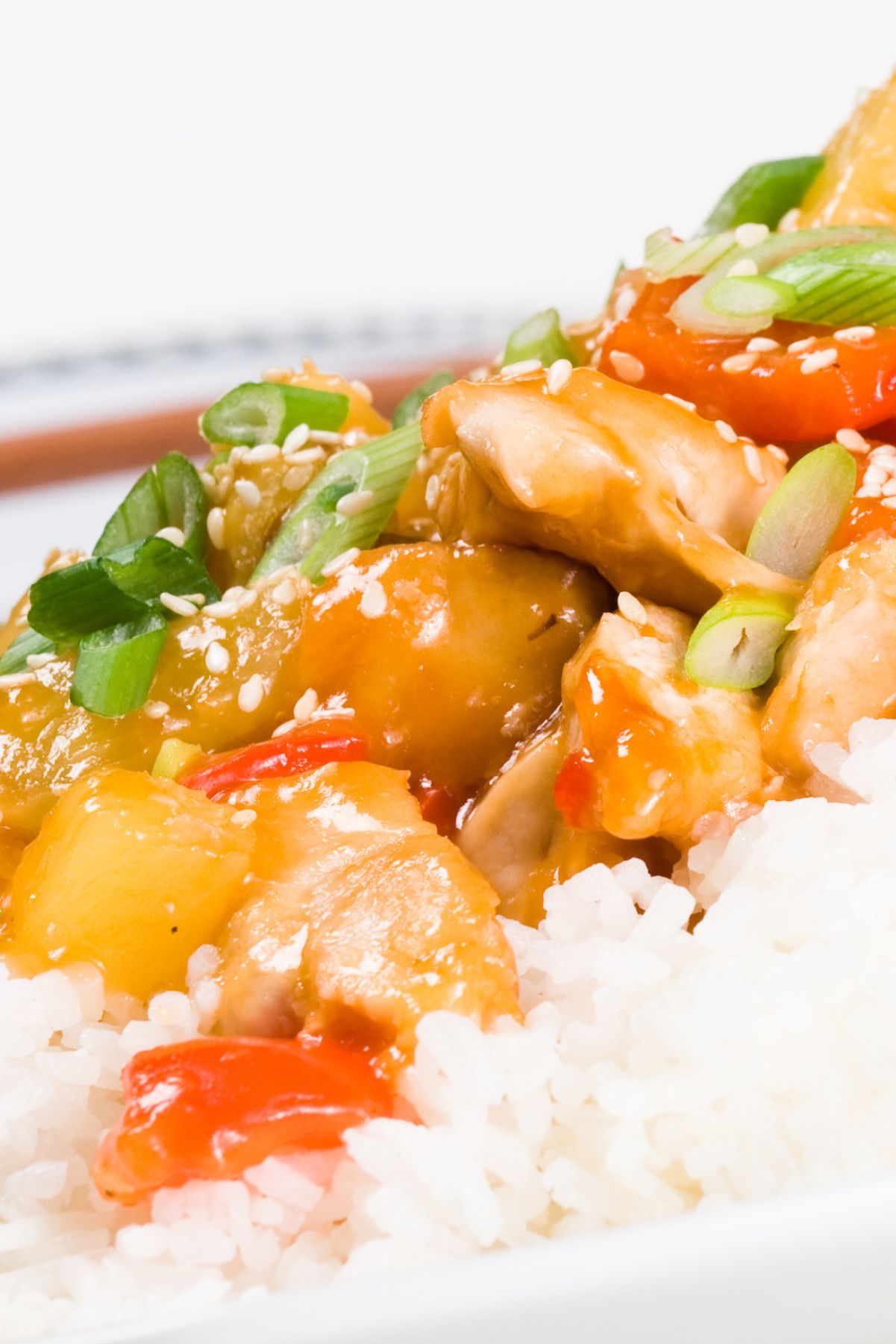 Closeup of Weight Watchers Chinese Chicken Pineapple Stir-Fry on a bed of rice.