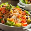 Closeup of Weight Watchers Zesty Lime Chicken Taco Salad in a white bowl.