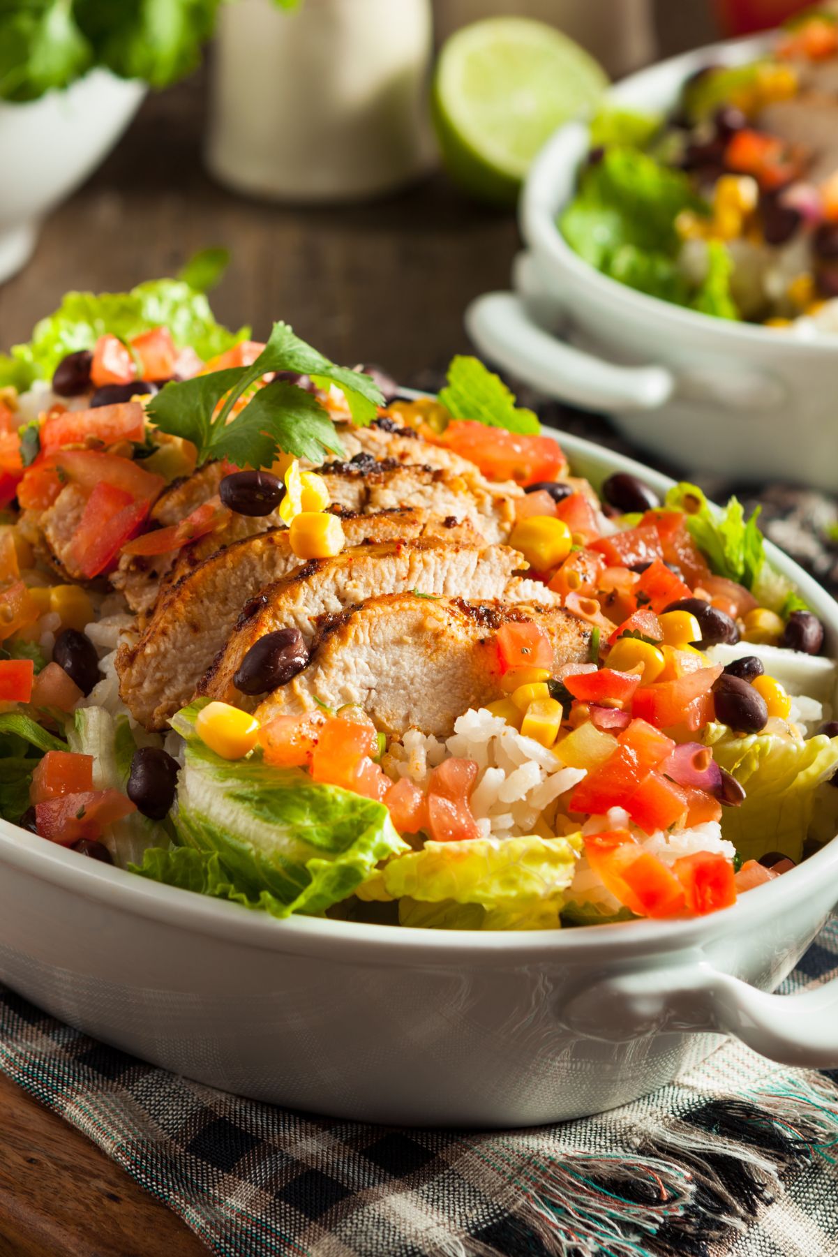 Closeup of Weight Watchers Zesty Lime Chicken Taco Salad in a white bowl.