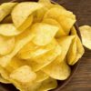 WW Friendly Potato Chips (Air Fryer) in a bowl on a dark surface.