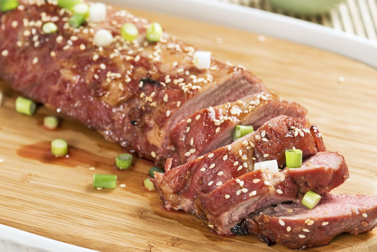 Crockpot Teriyaki Pork Tenderloin is a healthy meal that makes dinner simple. Start by browning the pork, then let it cook in the slow cooker until it turns really tender. The sauce is made with soy sauce, garlic, ginger, and a bit of brown sugar. As the pork cooks, these flavors soak in. Just before serving, add some sesame seeds for a finishing touch. This is a great weeknight dinner because it uses just a few ingredients and doesn’t take much time. Prep is quick, and after you put everything in the crockpot, there’s nothing else to do.