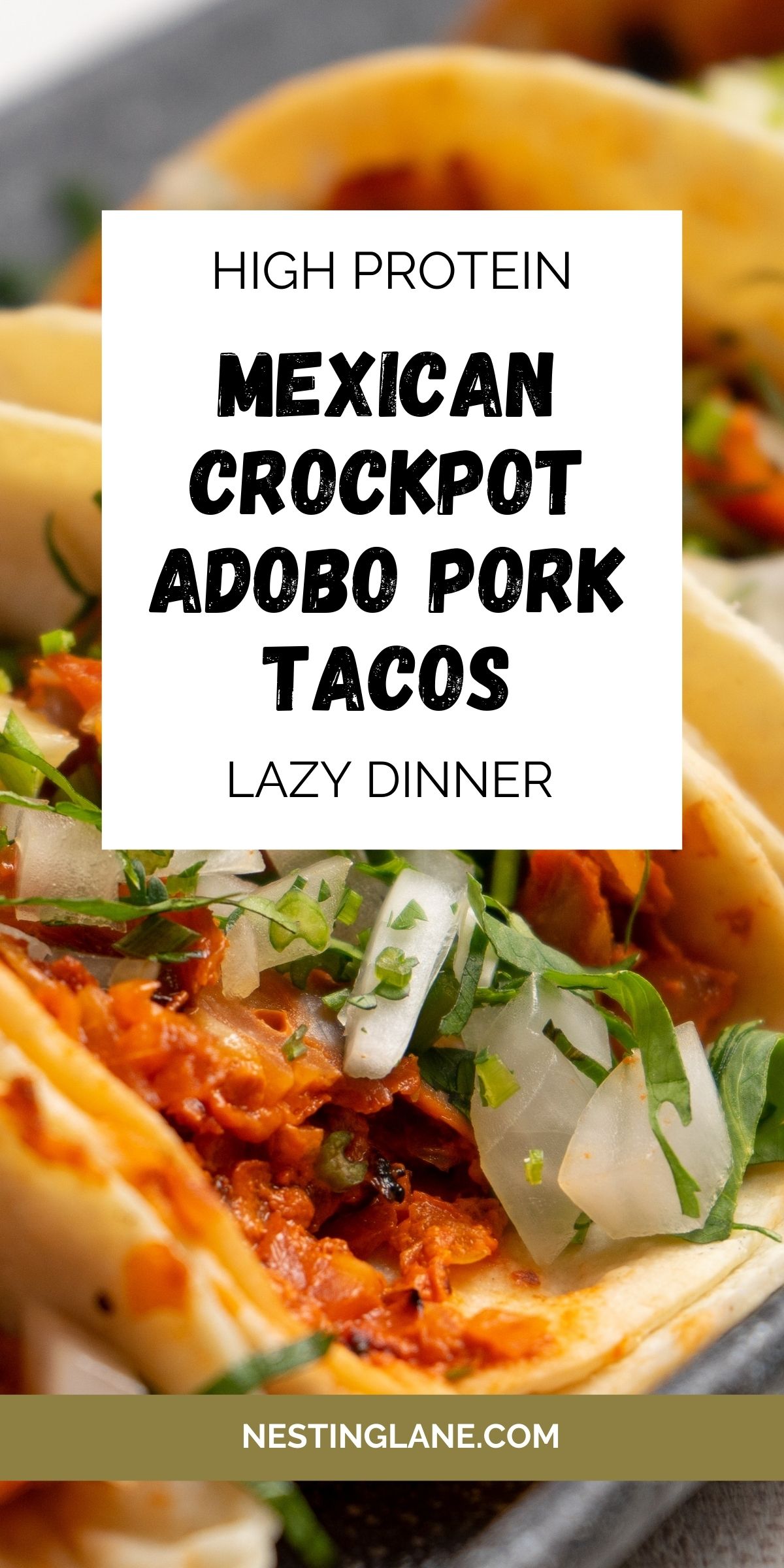 Soft tortillas filled with shredded adobo pork, topped with fresh cilantro and diced onions. The tacos are styled close-up on a plate, showing the rich red sauce and tender texture of the slow-cooked pork. A white box in the center reads: “High Protein Mexican Crockpot Adobo Pork Tacos Lazy Dinner.” At the bottom, a green banner displays “NESTINGLANE.COM.”