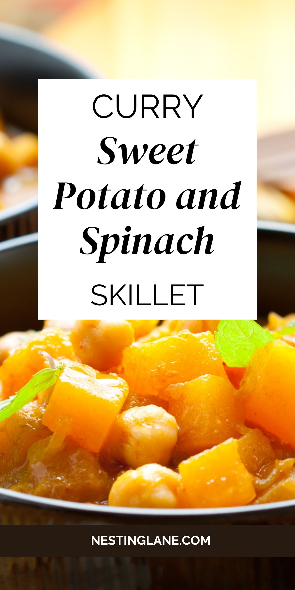 Close-up of a hearty vegetarian curry in a black bowl with orange sweet potato cubes, chickpeas, and a green herb garnish against a warm background. Overlaid text: “CURRY Sweet Potato and Spinach SKILLET.” Footer text: “NESTINGLANE.COM.”