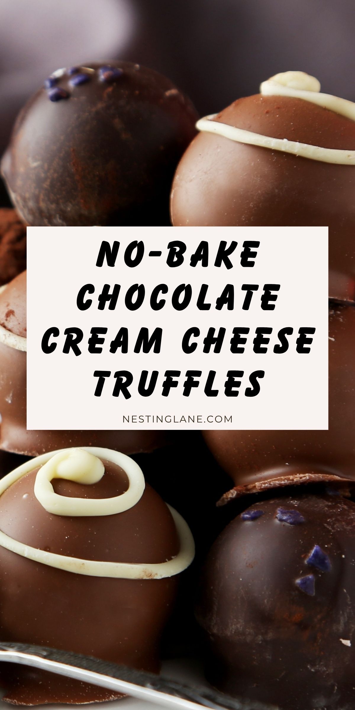 Close-up of milk and dark chocolate truffles stacked on a plate, some cocoa-dusted and others topped with white chocolate swirls. Center banner text: “NO-BAKE CHOCOLATE CREAM CHEESE TRUFFLES.” Footer: “NESTINGLANE.COM.”