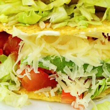 closeup of Avocado Tacos with Easy Jalapeño Hot Sauce.