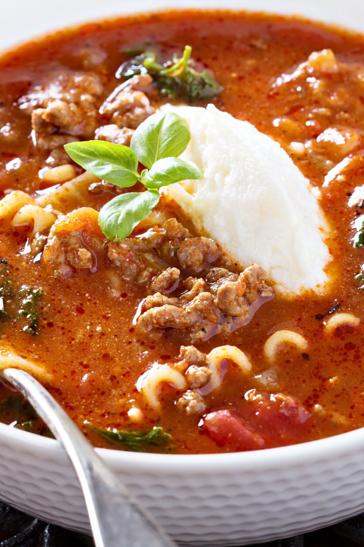 Quick One-Pot Lasagna Soup (with Ground Beef) in a white bowl.