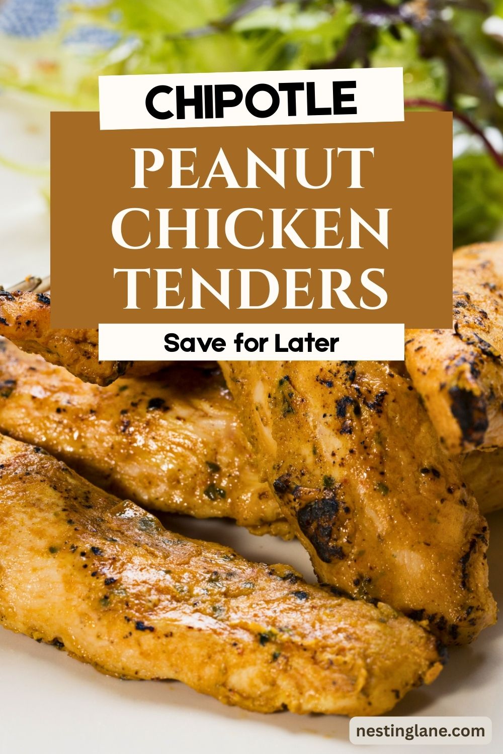 Golden chipotle peanut chicken tenders with a lightly charred, seasoned exterior on a white plate, served with leafy greens in the background. Overlaid text reads “CHIPOTLE,” “PEANUT CHICKEN TENDERS,” and “Save for Later.” Nestinglane.com shown in the corner.