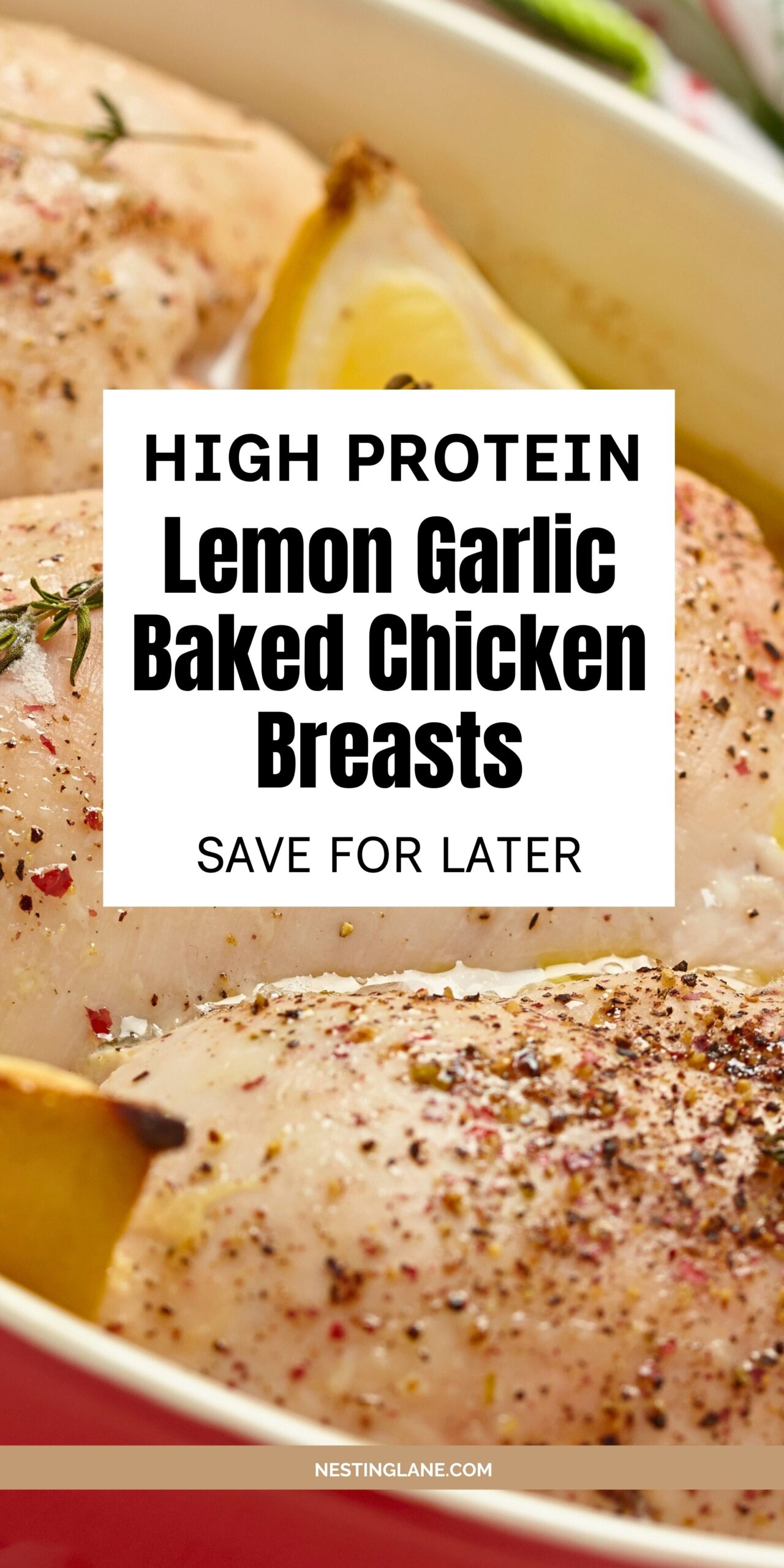 Close-up of seasoned chicken breasts in a baking dish with lemon slices and herbs, ready for the oven. Text overlay: “HIGH PROTEIN Lemon Garlic Baked Chicken Breasts” and “SAVE FOR LATER.” Bottom text: “NESTINGLANE.COM.”
