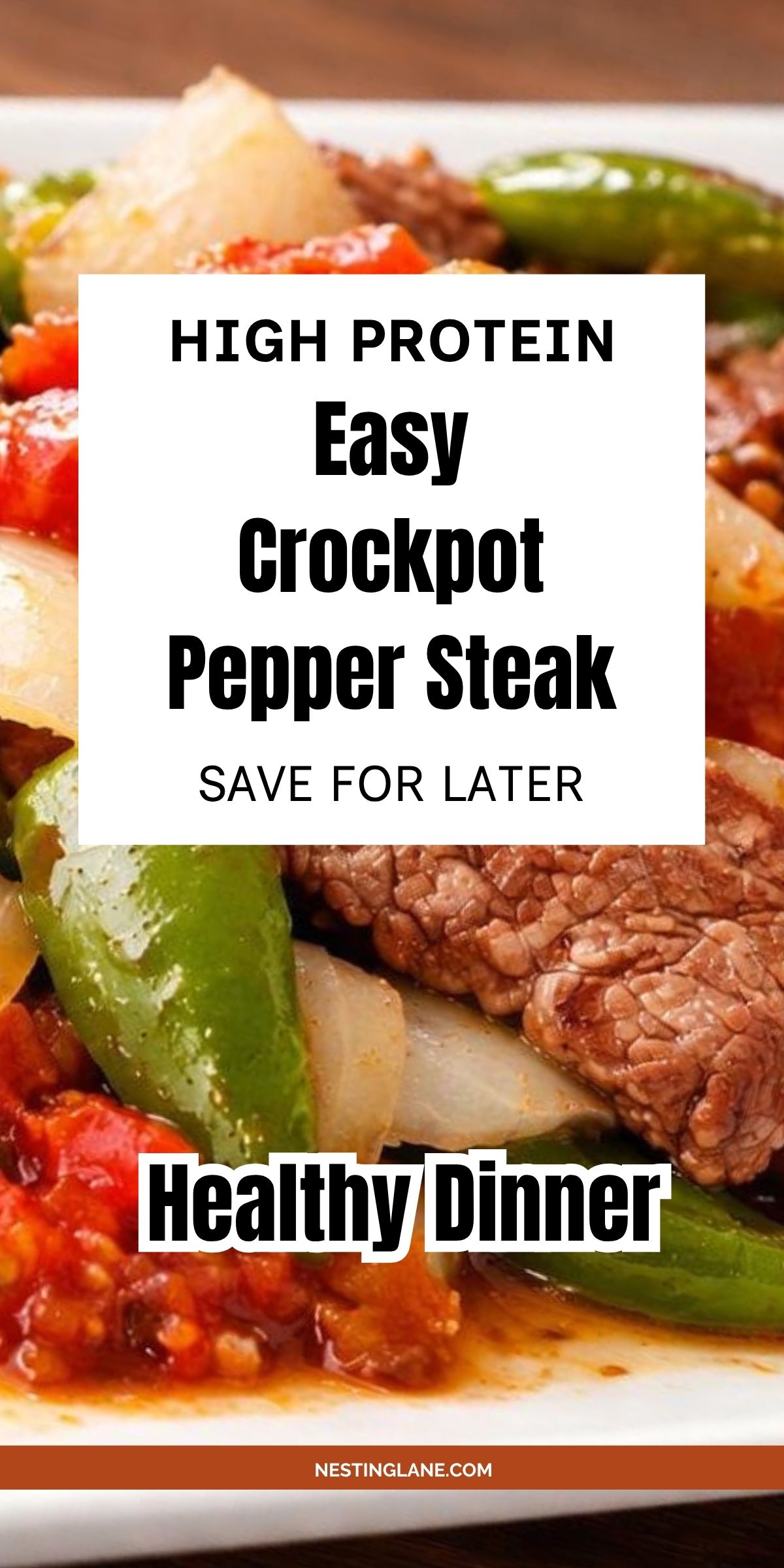 Pinterest pin for a high protein crockpot pepper steak recipe. Close-up of tender beef strips with green bell peppers, onions, and chunky tomato sauce on a white plate. Text reads: “HIGH PROTEIN Easy Crockpot Pepper Steak SAVE FOR LATER” and “Healthy Dinner.” Bottom text: “NESTINGLANE.COM”.